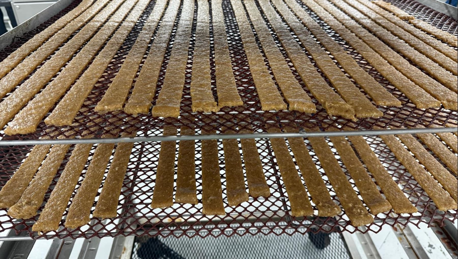 Full trays of uniform jerky strips